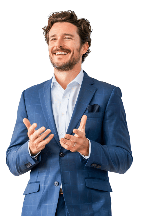 A man in a blue suit smiling.